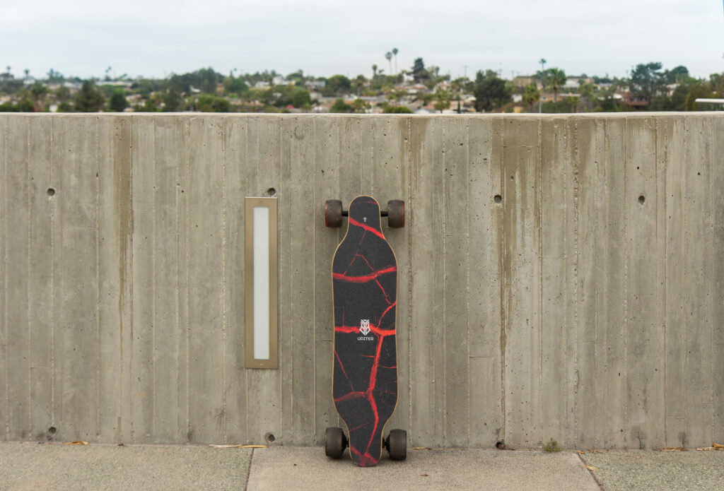 uditer s3 skateboard against wall